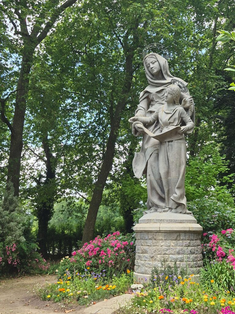 The statue of St. Anne and Mary in the gardens in front of the Basilica of St. Anne