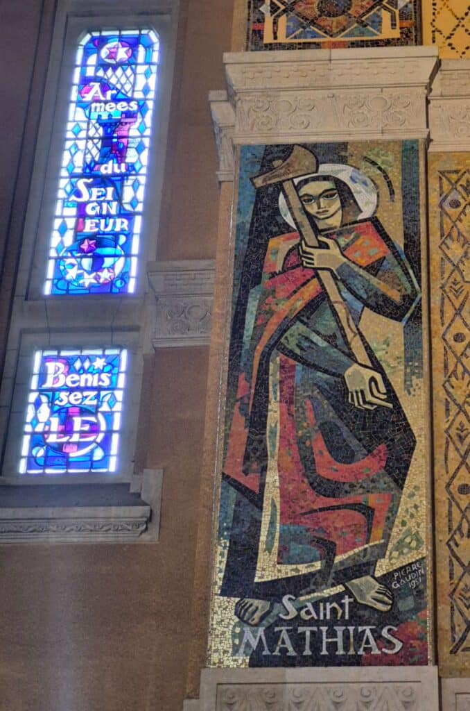 Mosaic of St. Matthias on a column on the left side of the nave